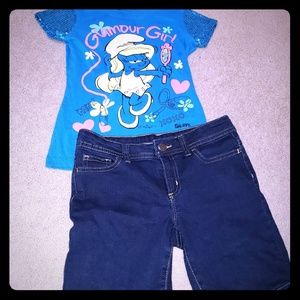 Girl's smurfs T-shirt and dark blue Jean shorts